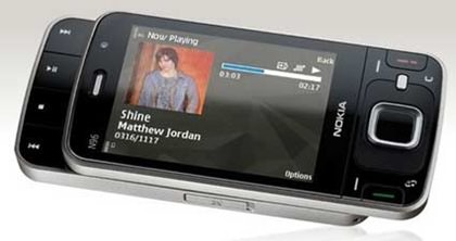 Celular Nokia n96 semi aberto, tocando vídeo
